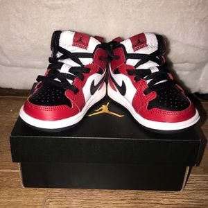 Red. Black and white toddler Jordan’s. Brand new. Size 4c.